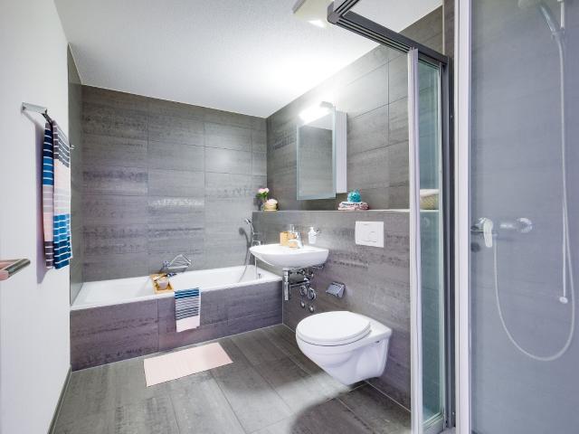 Moderne Parterrewohnung mit 28m2 Gartensitzplatz. Dreamo. Ch