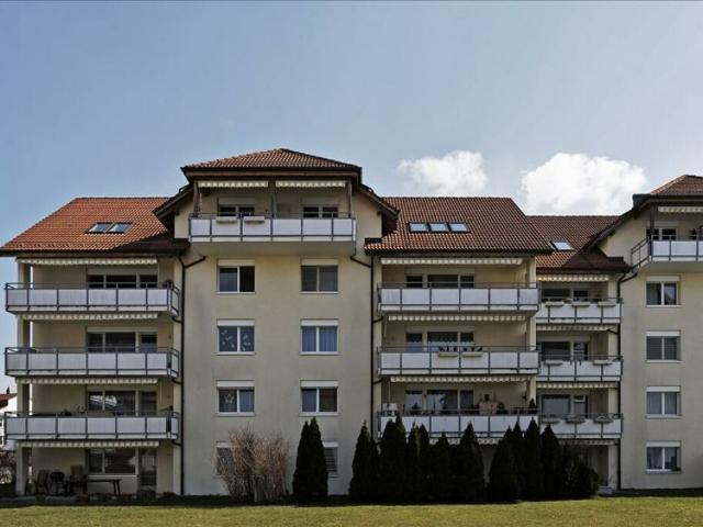 Moderne Wohnung mit Gartensitzplatz!