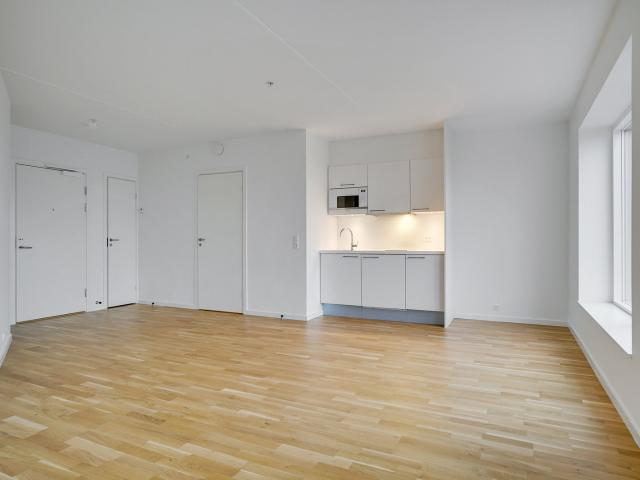 Moderne 1 værelses med fælles tagterrasse i Valby