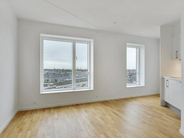 Moderne 1 værelses med fælles tagterrasse i Valby