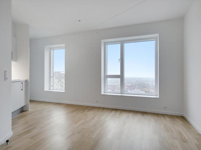 Moderne 1 værelses med fælles tagterrasse i Valby