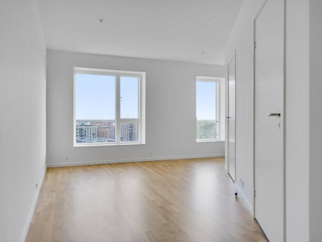 Moderne 1 værelses med fælles tagterrasse i Valby