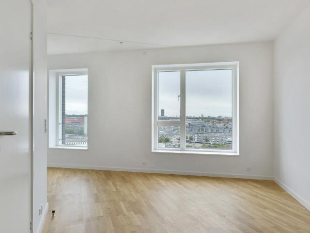 Moderne 1 værelses med fælles tagterrasse i Valby