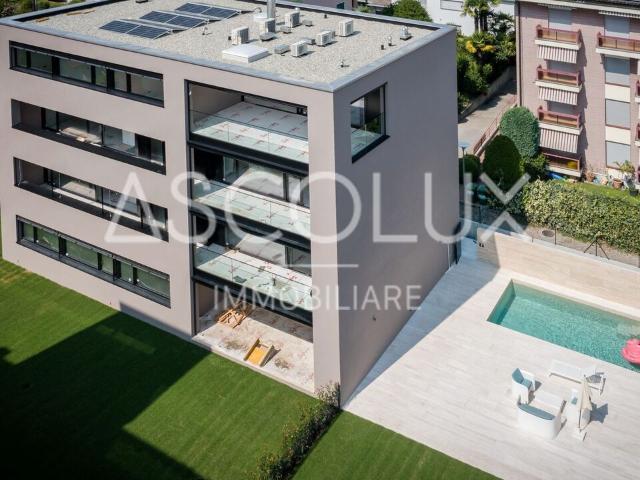 Moderne 2.5 Zimmer Wohnung in Residenz mit beheiztem Aussenpool und Sauna | Modernes 2.5 Zimmer Apartment in Residenz mit beheiztem Aussenpool und Sauna