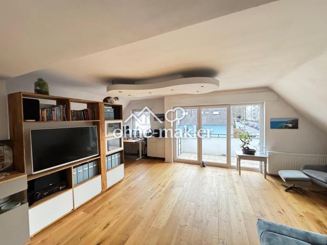 Moderne 2 Zimmer Dachgeschosswohnung mit offenem Wohnkonzept und Stellplatz
