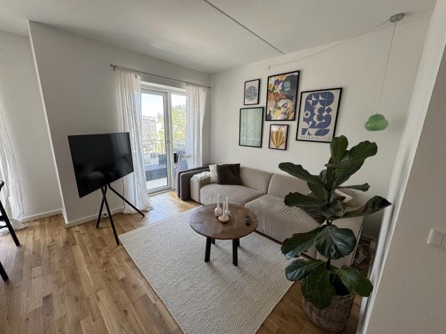 Moderne 3 værelses lejlighed med stor gårdhave i Bella