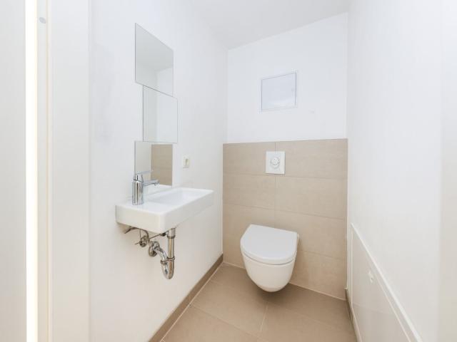 Moderne 3 Zimmer Wohnung im Zubau eines sanierten Altbaus mit großzügiger Dachterrasse