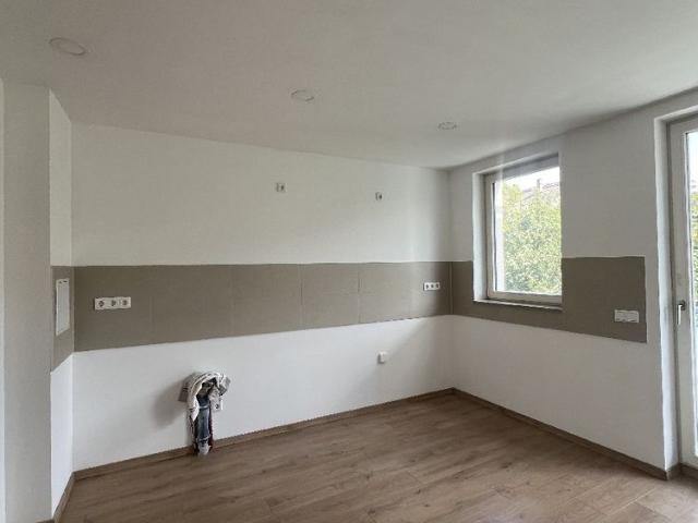 Moderne 4 Zimmer Neubauwohnung mit Deckenheizung, großem Balkon und Aufzug in zentraler Lage