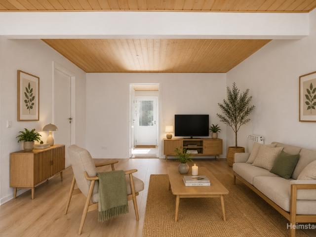 Moderne 5 værelses rækkehus med egen have i Skødstrup