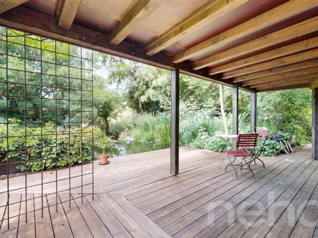 Modernes Wohnen im Grünen: 6.5 Zimmer Haus mit Schwimmteich