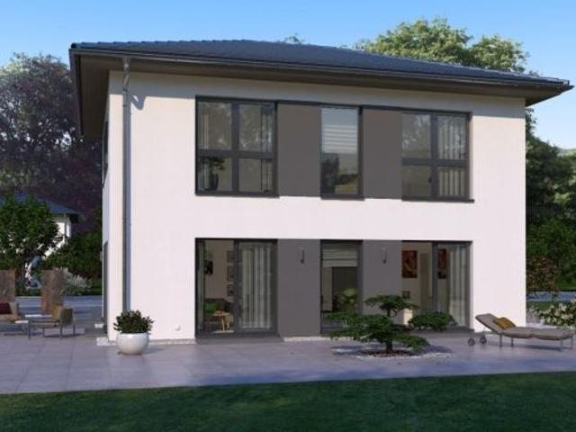 MODERNES WOHNHAUS MIT ELEGANTEM WALMDACH