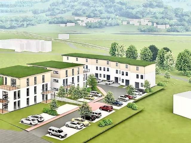 Moderner Neubau Reihenhaus und 20 Eigentumswohnungen