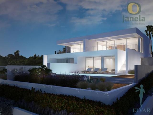 Modernidade e Sofisticação junto à Praia da Luz, com piscina privada, jardim e garagem