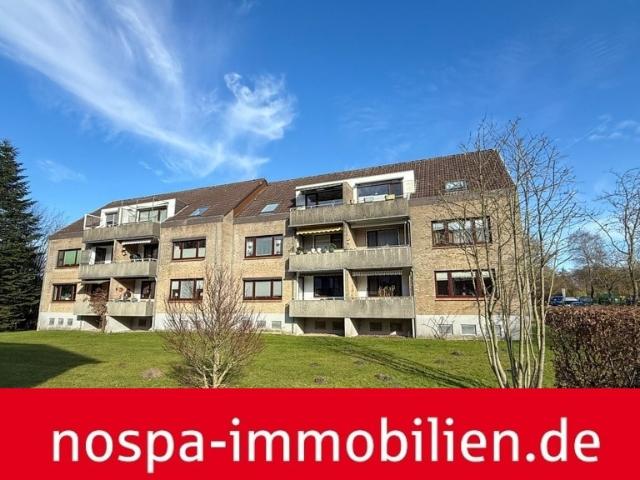 Modernisierte, sonnige 3 Zimmer Dachgeschosswohnung mit Balkon und PKW Stellplatz