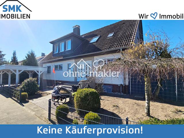 Modernisiertes Zweifamilienhaus mit Garten, Garage & Carport!