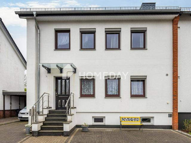 Modernisiertes Einfamilienhaus mit flexibler Aufteilung, viel Platz und großem Garten