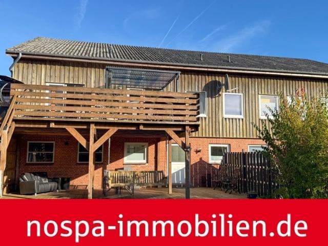 Modernisiertes Reihenmittelhaus mit Balkon, Garage und Doppelcarport!