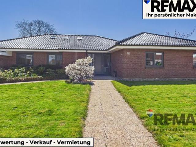 Modernisierter Bungalow mit kleiner Gewerbeeinheit in belebter Lage