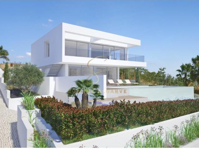 Moradia nova com vista mar, piscina e garagem na Praia da Lu. 295m² Luz