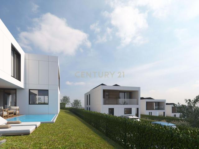 Moradia de Construção Passiva com Toque de Elegância, Privacidade e Piscina