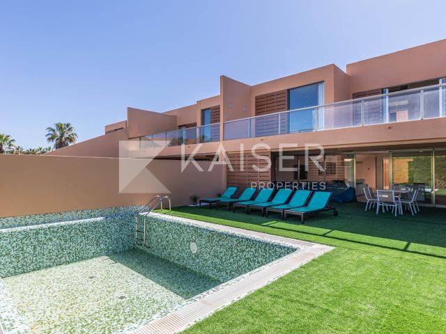 Moradia de luxo com piscina no prestigiado complexo de golfe privado a poucos passos da praia