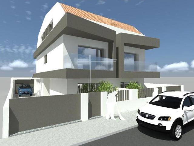 Moradia geminada T3+1, arquitetura contemporânea com parquea. 128m² Fernão Ferro