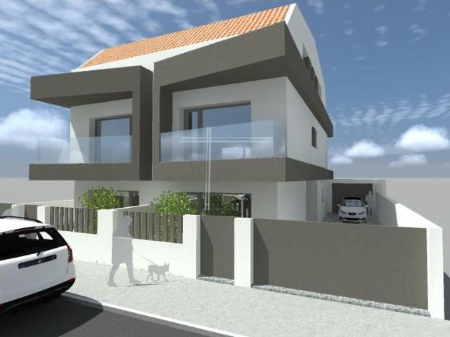 Moradia geminada T3+1, arquitetura contemporânea com parquea. 128m² Fernão Ferro