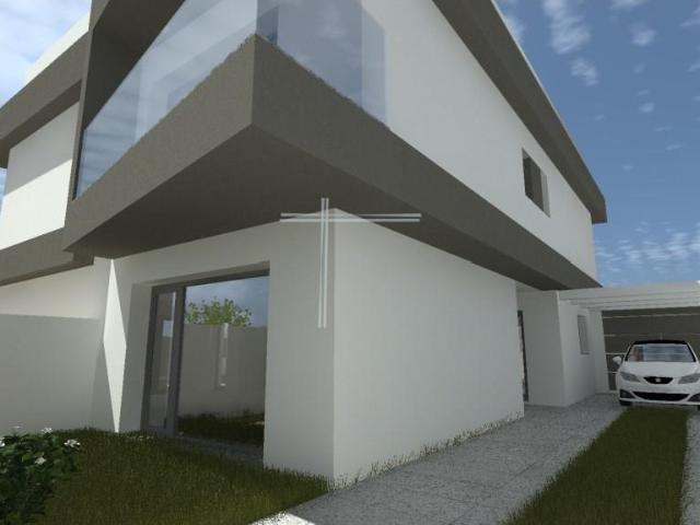 Moradia geminada T3+1, arquitetura contemporânea com parquea. 131m² Fernão Ferro