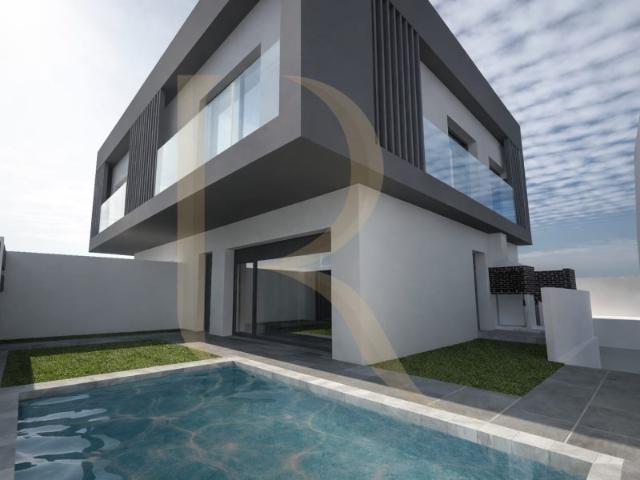 Moradia Geminada T3+1 nova com piscina e garagem no Pinhal do General, Seixal