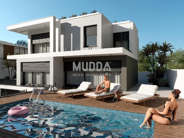 Moradia isolada de design contemporâneo nos Casais Mestre Mendo