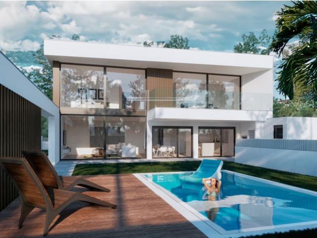 Moradia isolada T4, arquitetura contemporânea com garagem e piscina Aroeira