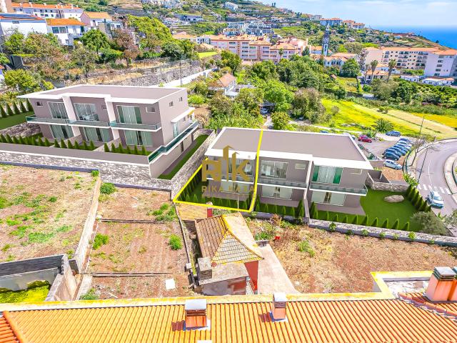 Moradia T3 em Banda Contemporânea com Jardim e Vista Mar
