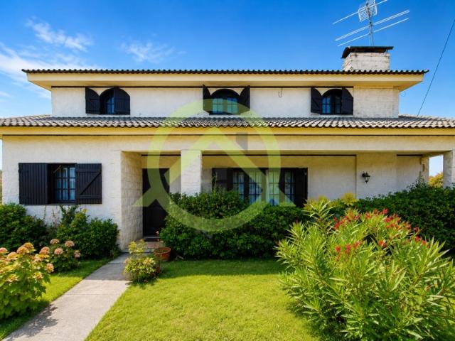 Moradia Térrea T3+2, com garagem, anexos, jardim e terreno com dois poços