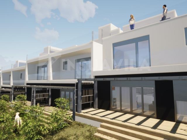 Moradias T3 em construção com vista mar