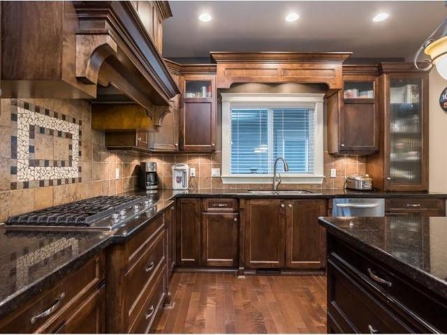 Morgan Heights Five Bedrooms Plus Den