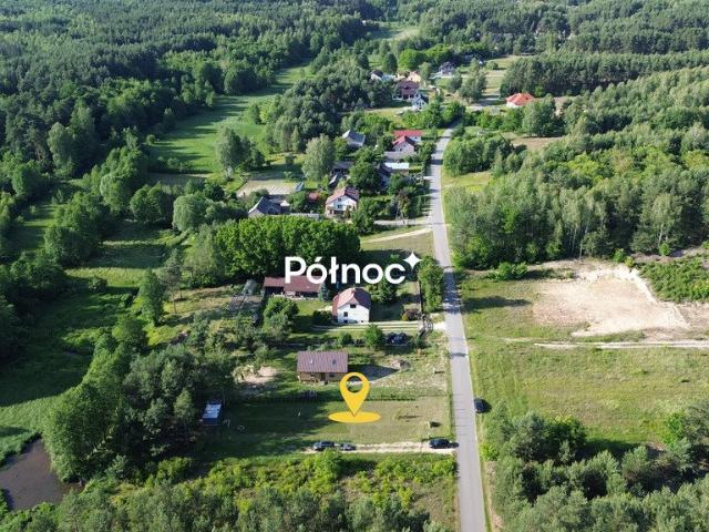 Działka 1449 m² z garażem i strumykiem w spokojnej okolicy