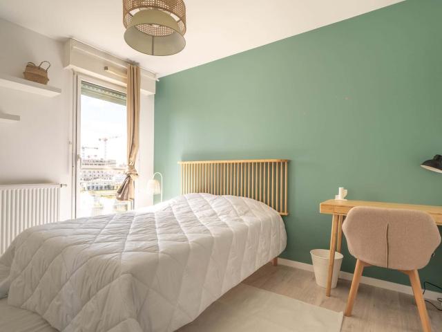 Move into this minimalist 12 m² room for rent in a coliving space on the Île de Nantes NT15