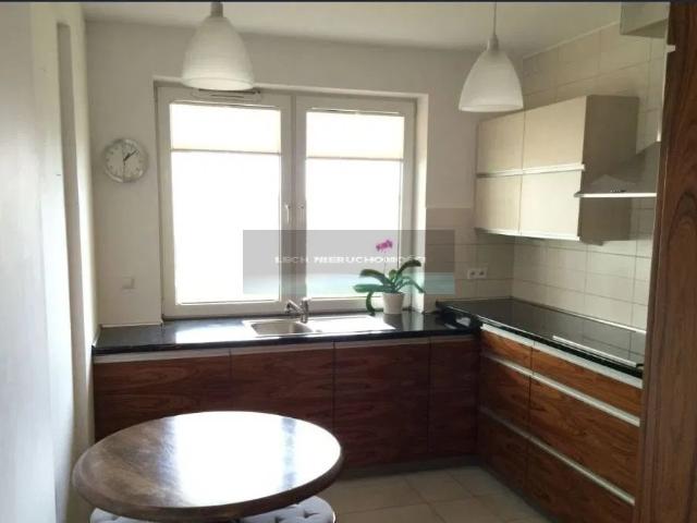 Na sprzedaż przestronne 2 pokojowe mieszkanie 59 m² z balkonem i miejscem garażowym