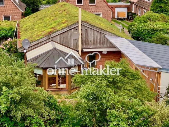 Nachhaltiger Bungalow mit Wintergarten, Garage und Garten