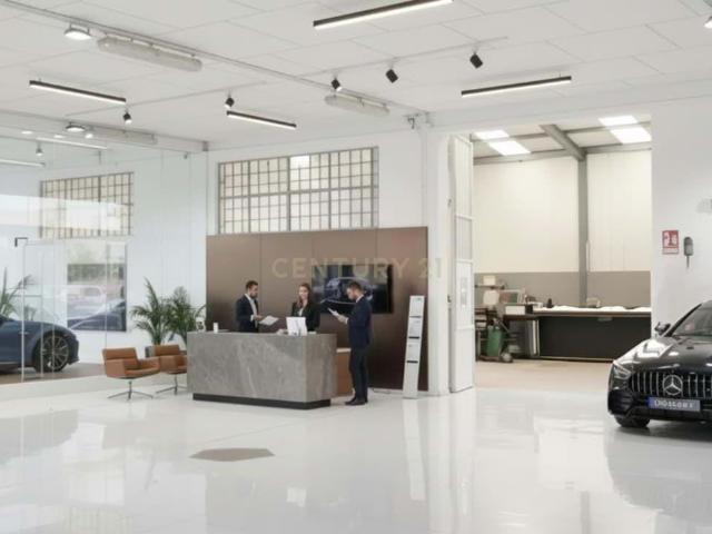 Nave industrial automoción · 1.800 m² · Licencia activa · Zona exposición + taller + cabina pintura · Av. Reguera, Móstoles