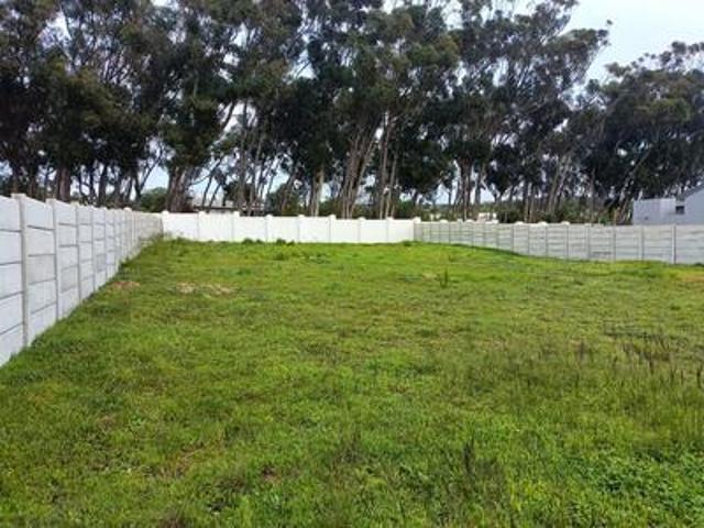 neat and secure vacant land with sce.