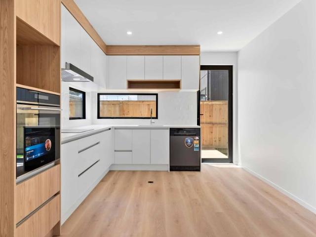 Near New Corner Townhouse Fully Fenced with Exceptional Indoor/Outdoor Flow