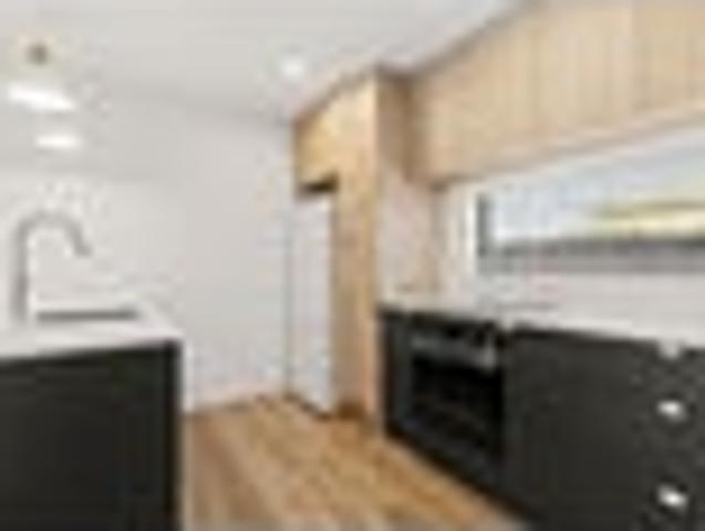 Near New, End Unit & North Facing!