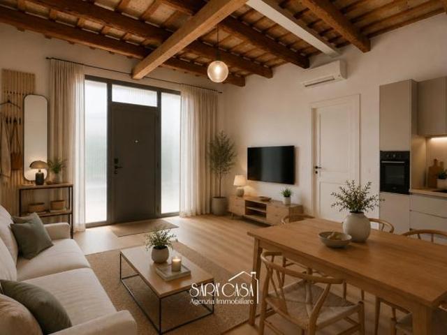 Negozio al piano terra con veranda e corte esclusiva