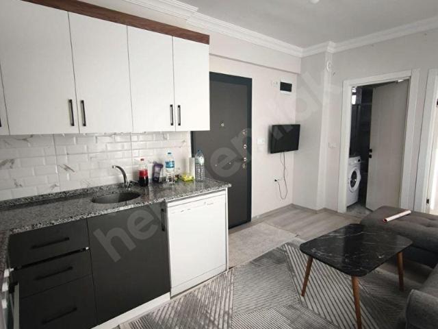 NETA'DAN KARŞIYAKA MERKEZİ KONUM EŞYALARIYA SATILIK 1+1 DAİRE