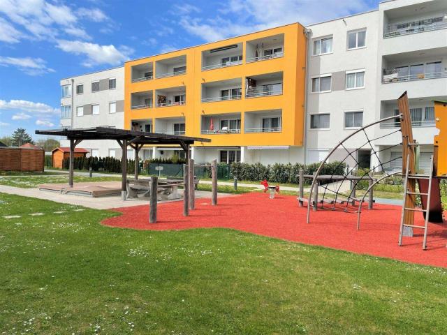 Neuwertige 3 Zimmer Norikum Wohnung mit einem gemütlichen Garten