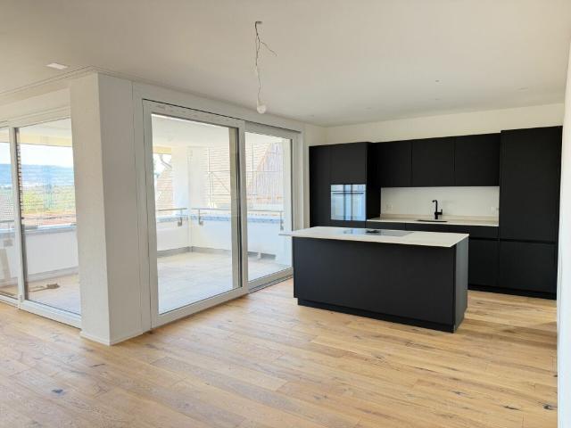 Neubau 3.5 Zimmer Gartenwohnung mit Einstellhalle
