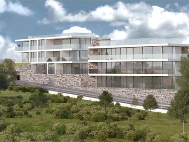 Neubau 3 1/2 Zimmer Gartenwohnung an zentraler, sonniger Seeblicklage / nuovo appartamento di 3 1/2 locali con giardino centrale e vista lago