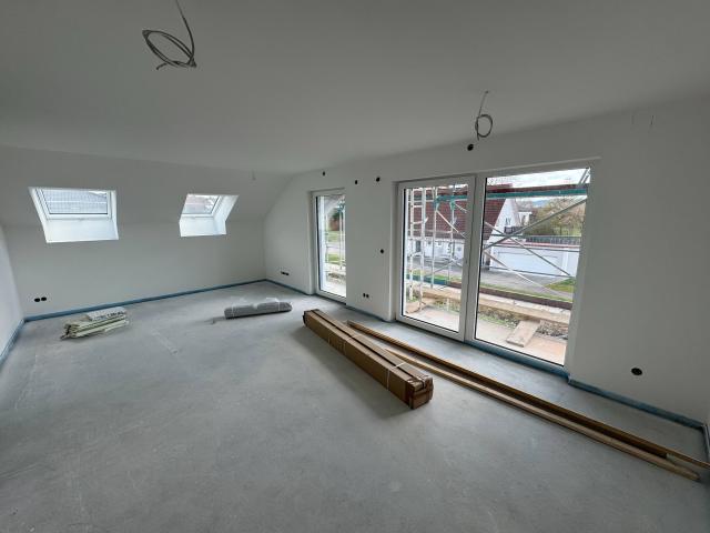 Neubau 2 Zimmer DG Wohnung mit Loggia & Carport
