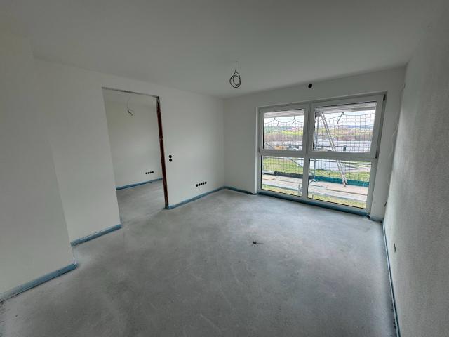 Neubau 2 Zimmer DG Wohnung mit Loggia & Stellplatz